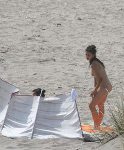 Topless-girl-goes-full-nudist-at-textile-beach-Almeria-%28Spain%29-e6w4xtt60g.jpg