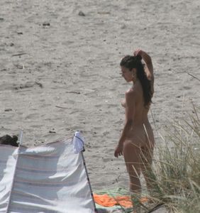 Topless-girl-goes-full-nudist-at-textile-beach-Almeria-%28Spain%29-s6w4xtutfm.jpg