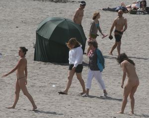 Topless girl goes full-nudist at textile beach  Almeria (Spain)-26w4xucs7u.jpg