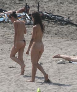 Topless girl goes full-nudist at textile beach  Almeria (Spain)-f6w4xuhij0.jpg