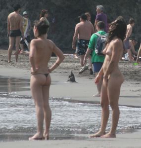 Topless girl goes full-nudist at textile beach  Almeria (Spain)-m6w4xu1i1z.jpg