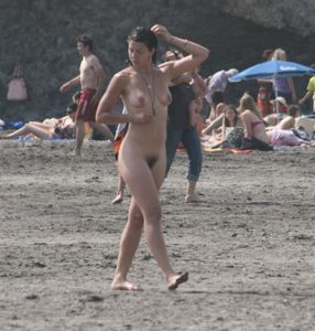 Topless girl goes full-nudist at textile beach  Almeria (Spain)-a6w4xu87oz.jpg