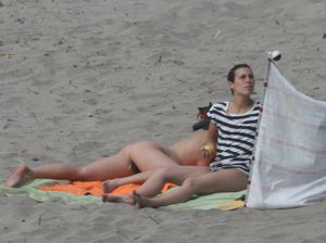 Topless-girl-goes-full-nudist-at-textile-beach-Almeria-%28Spain%29-b6w4xumq25.jpg