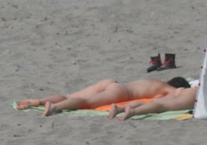 Topless girl goes full-nudist at textile beach  Almeria (Spain)-l6w4xuot3z.jpg