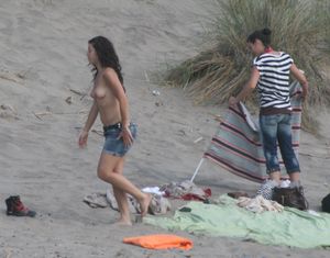 Topless girl goes full-nudist at textile beach  Almeria (Spain)-16w4xuvf0p.jpg