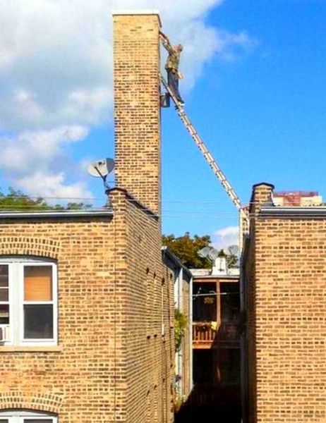 [Image: 49988239_man-roof-ladder-chimney.jpg]